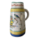 Old ceramic pitcher (18th century?) decorated with polychrome exotic birds