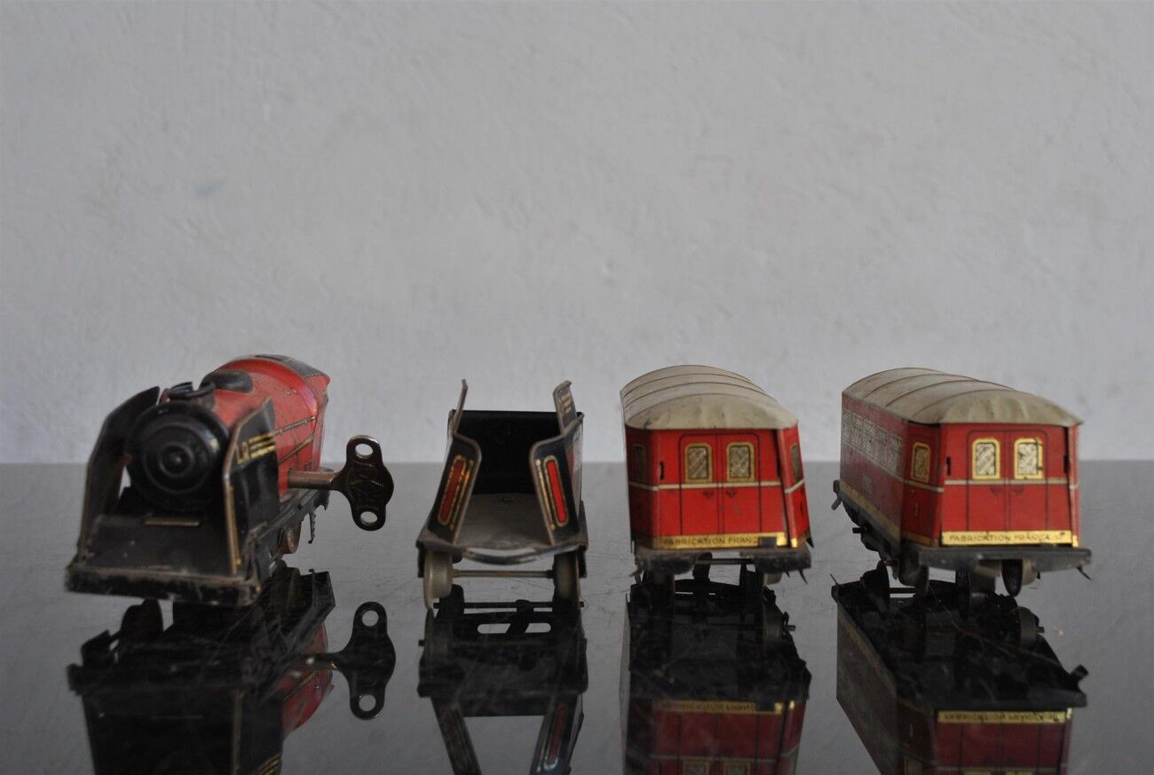 Tin litho brand LR spring-loaded toy locomotive