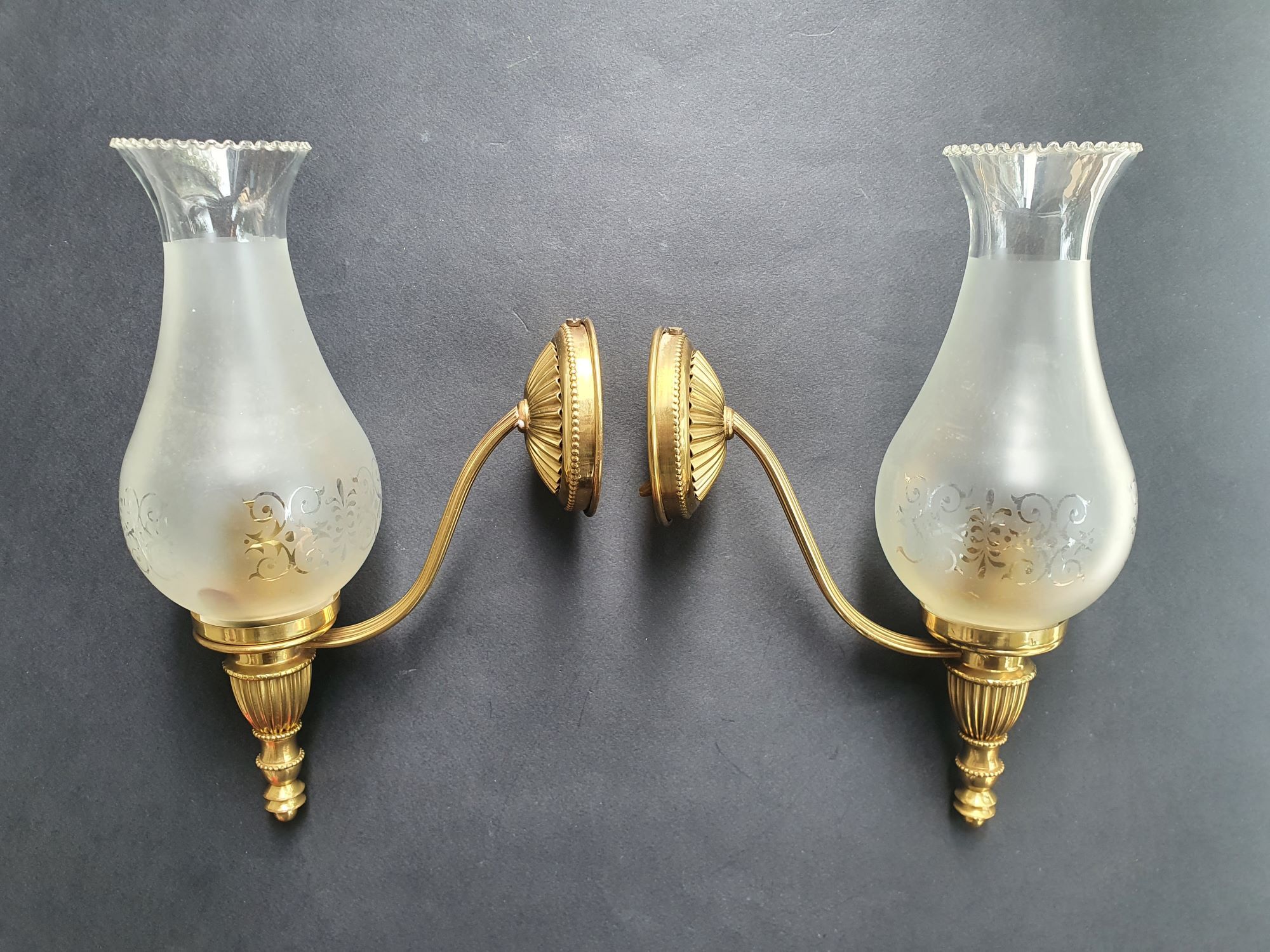 Pair of antique gold wall sconces