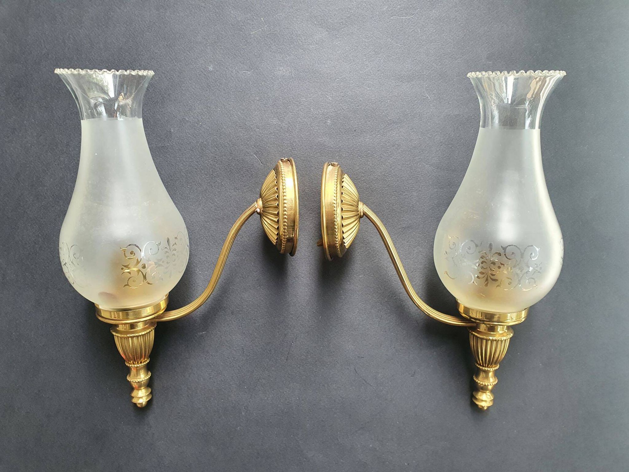Pair of antique gold wall sconces