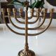 Ancient Menorah of Jerusalem/Jewish Candlestick with 7 tripod branches. Star David. In gilded bronze