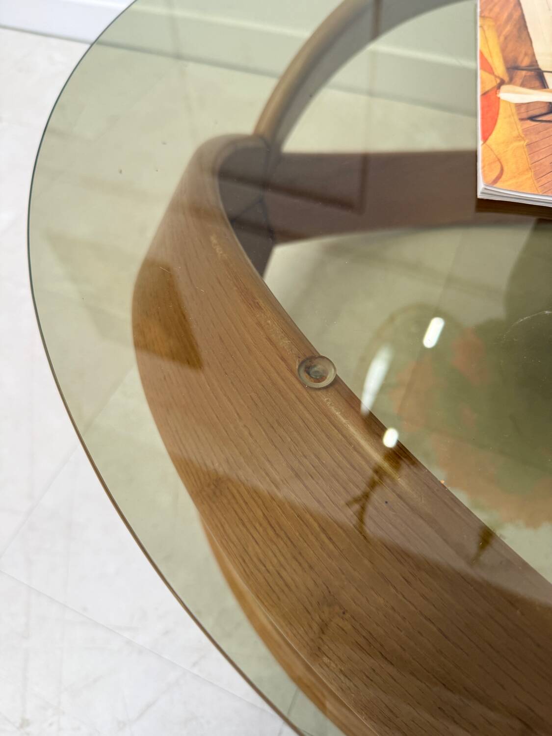 Smoked glass and curved wood coffee table
