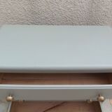 Vintage commode enhanced in grey-green.