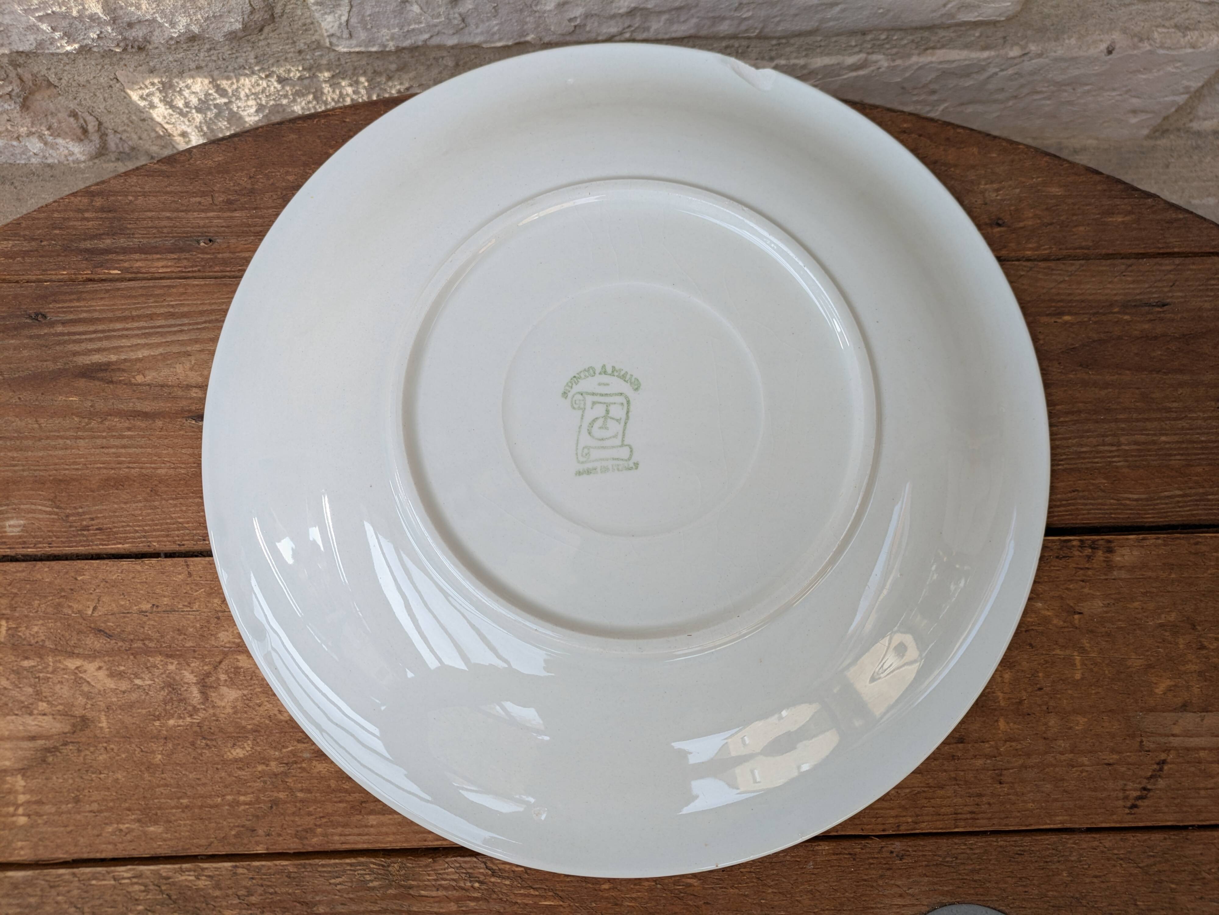 Round serving dish with hand-painted yellow flowers in ceramic TC Italy.