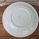 Round serving dish with hand-painted yellow flowers in ceramic TC Italy.