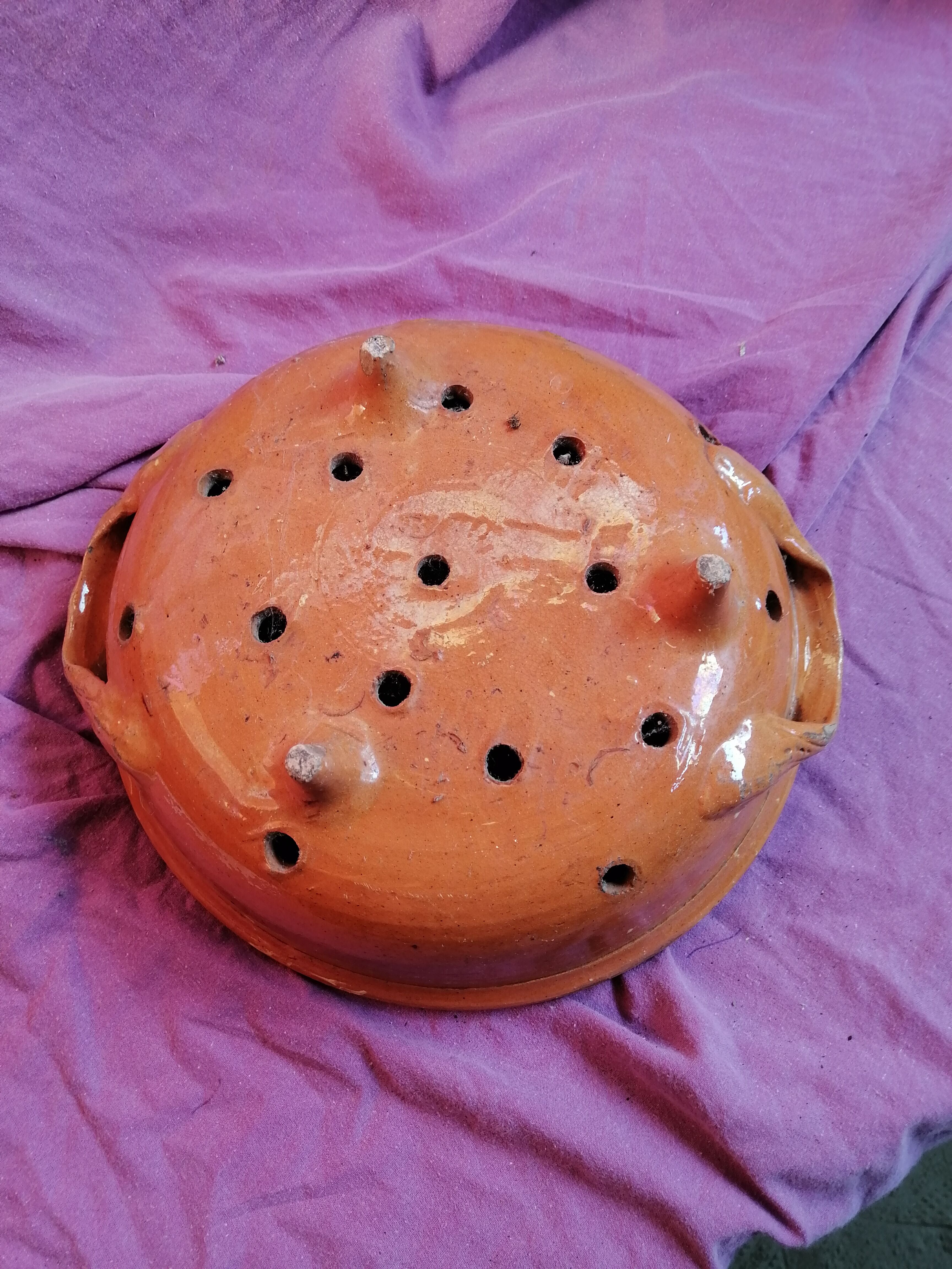 Old dish drainer in mud