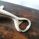 Silver metal seal bottle opener