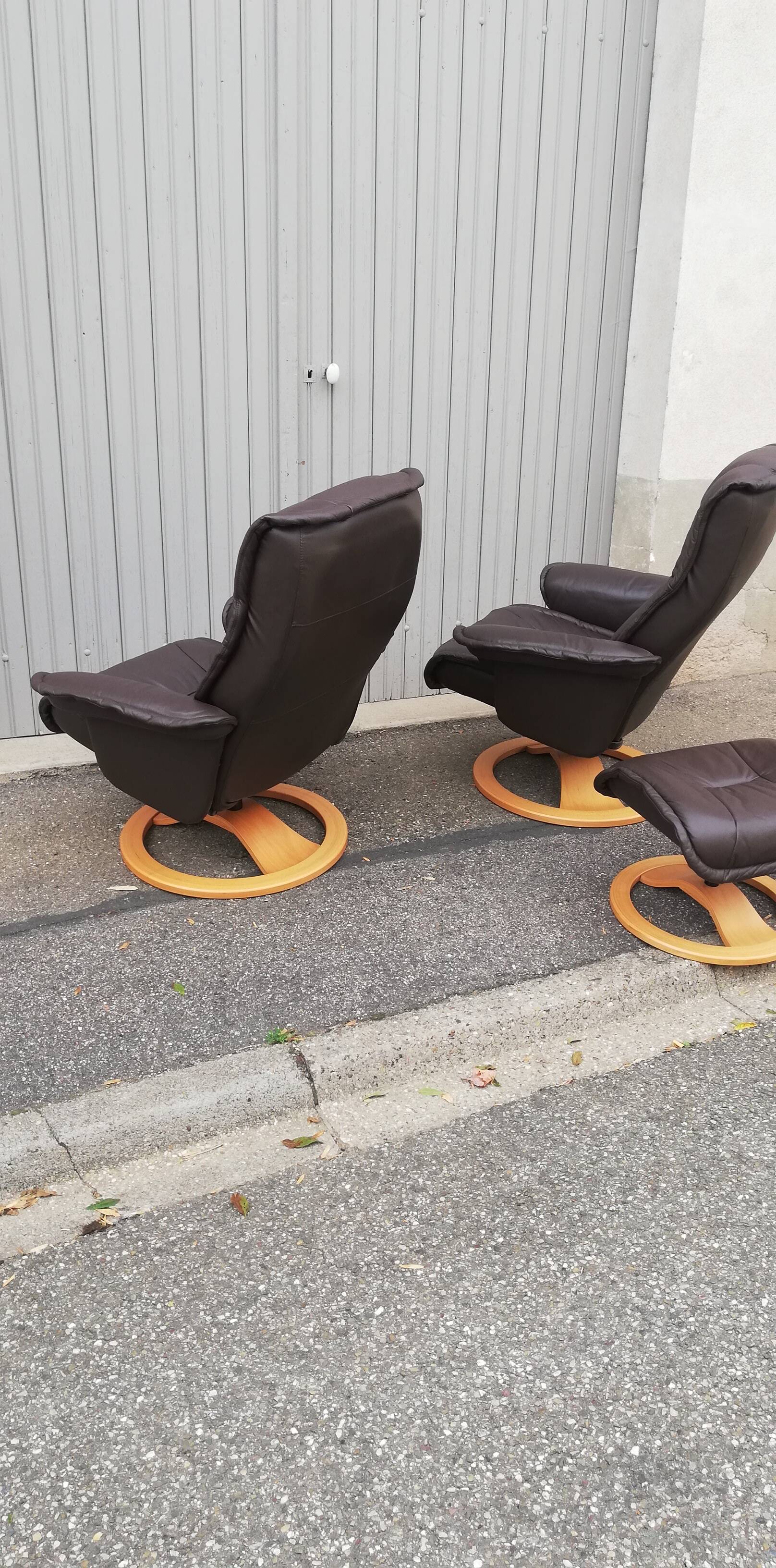Pair of vintage armchairs with ottoman