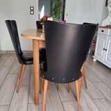 4 black Baumann style chairs