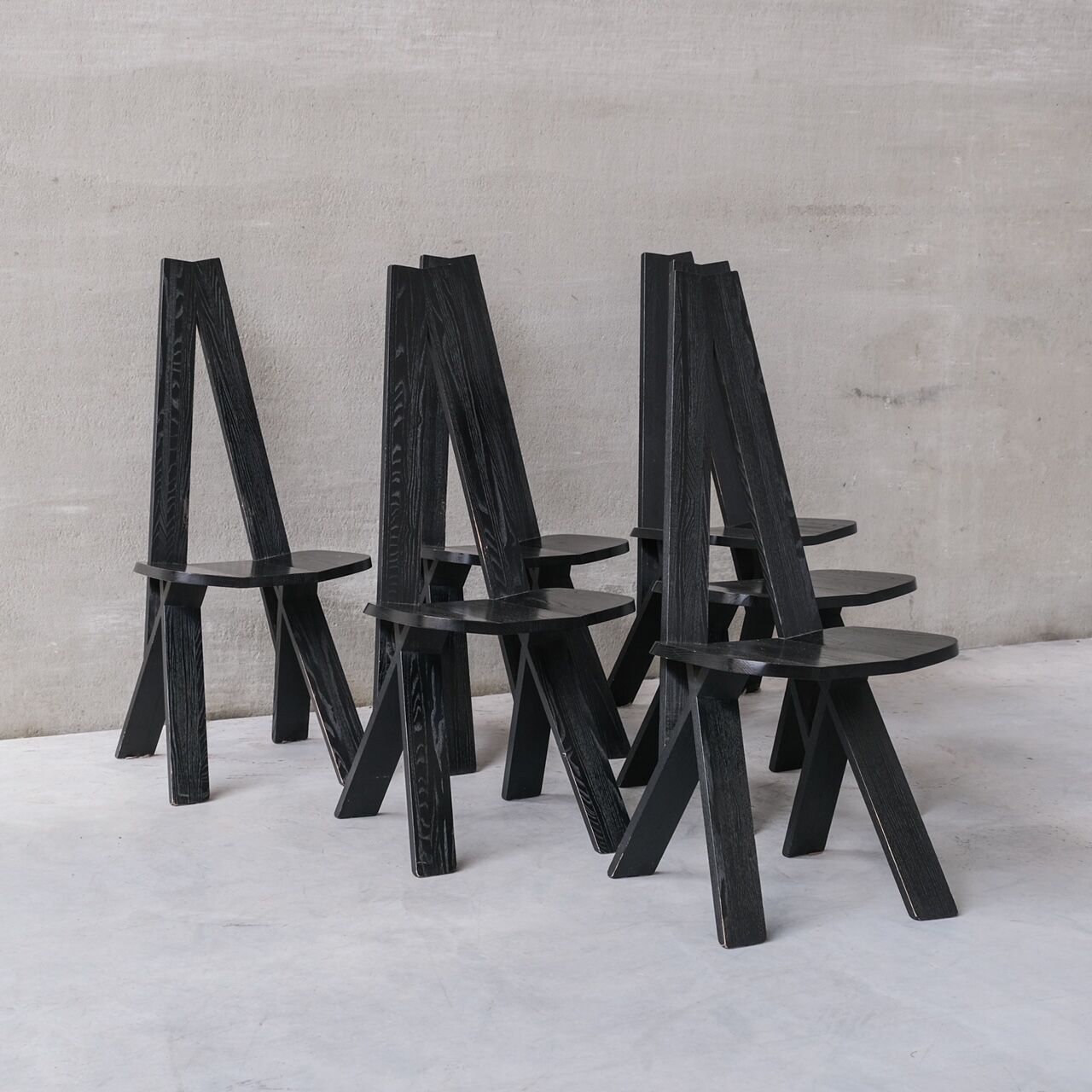 Set of six black dining chairs