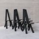 Set of six black dining chairs