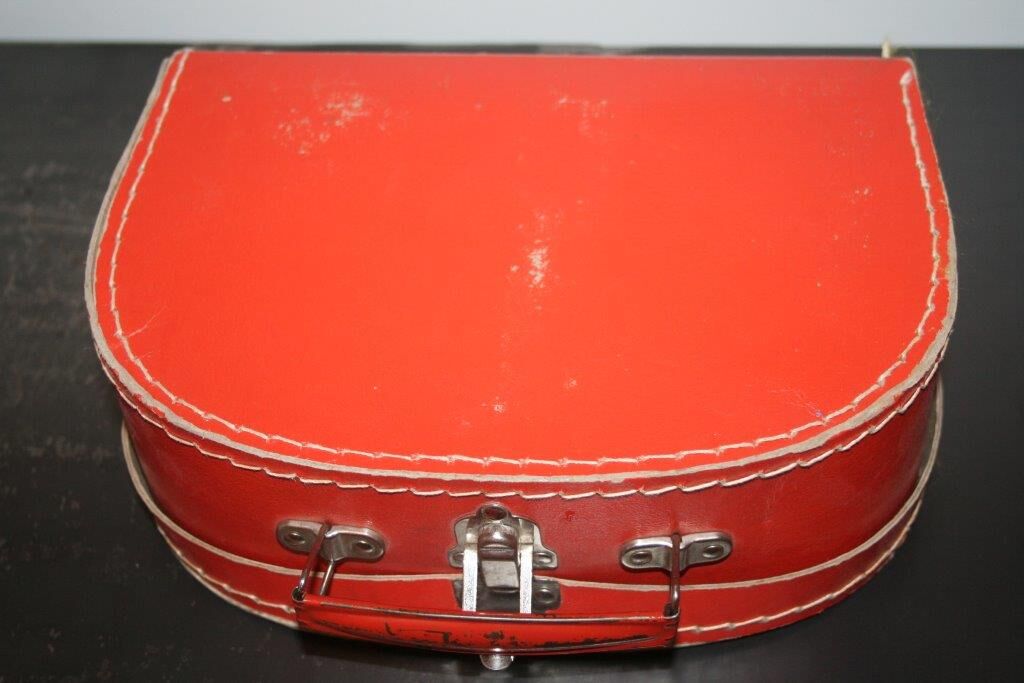 Small suitcase cardboard orange