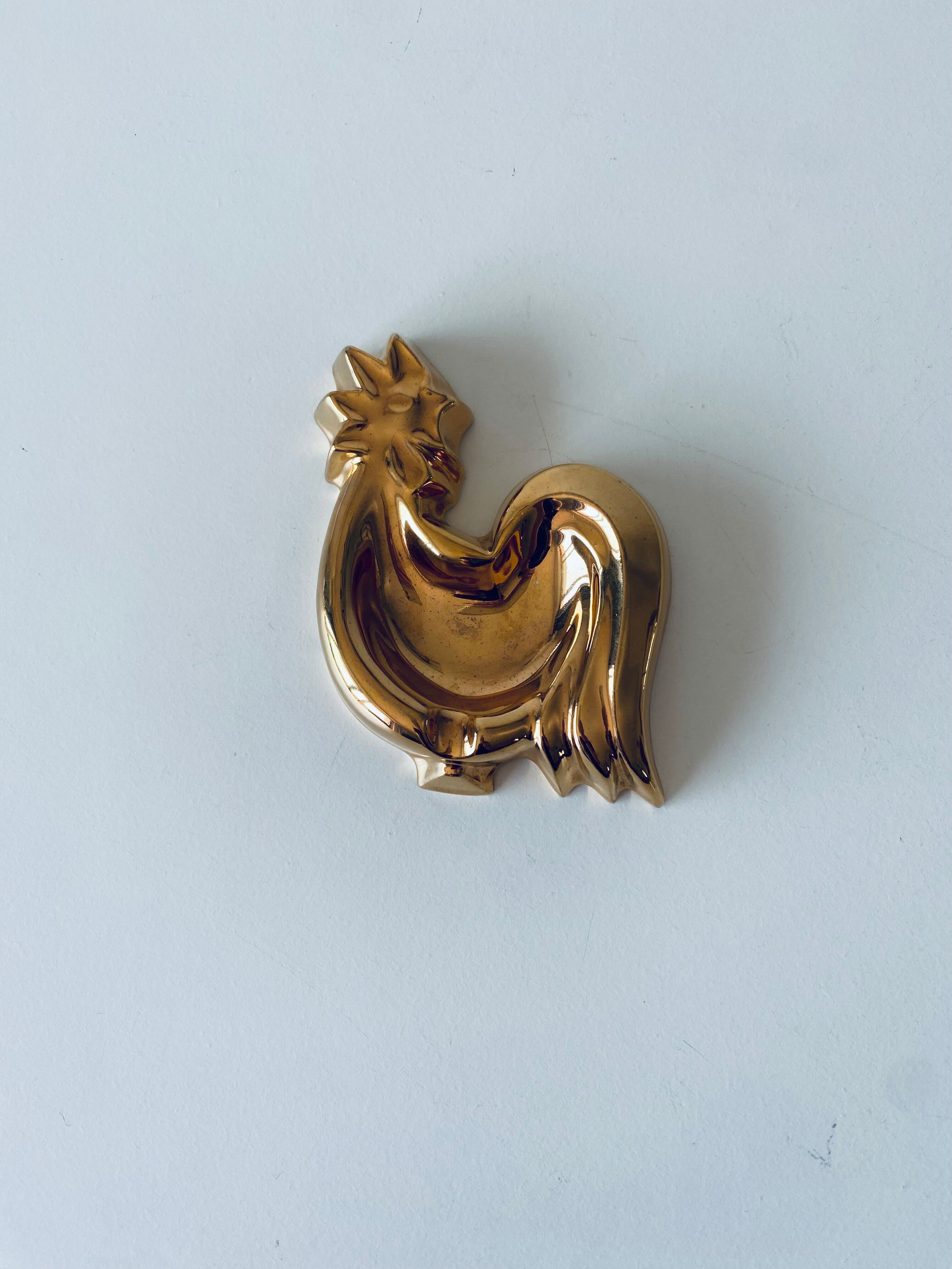 Vintage rooster in gilded ceramic