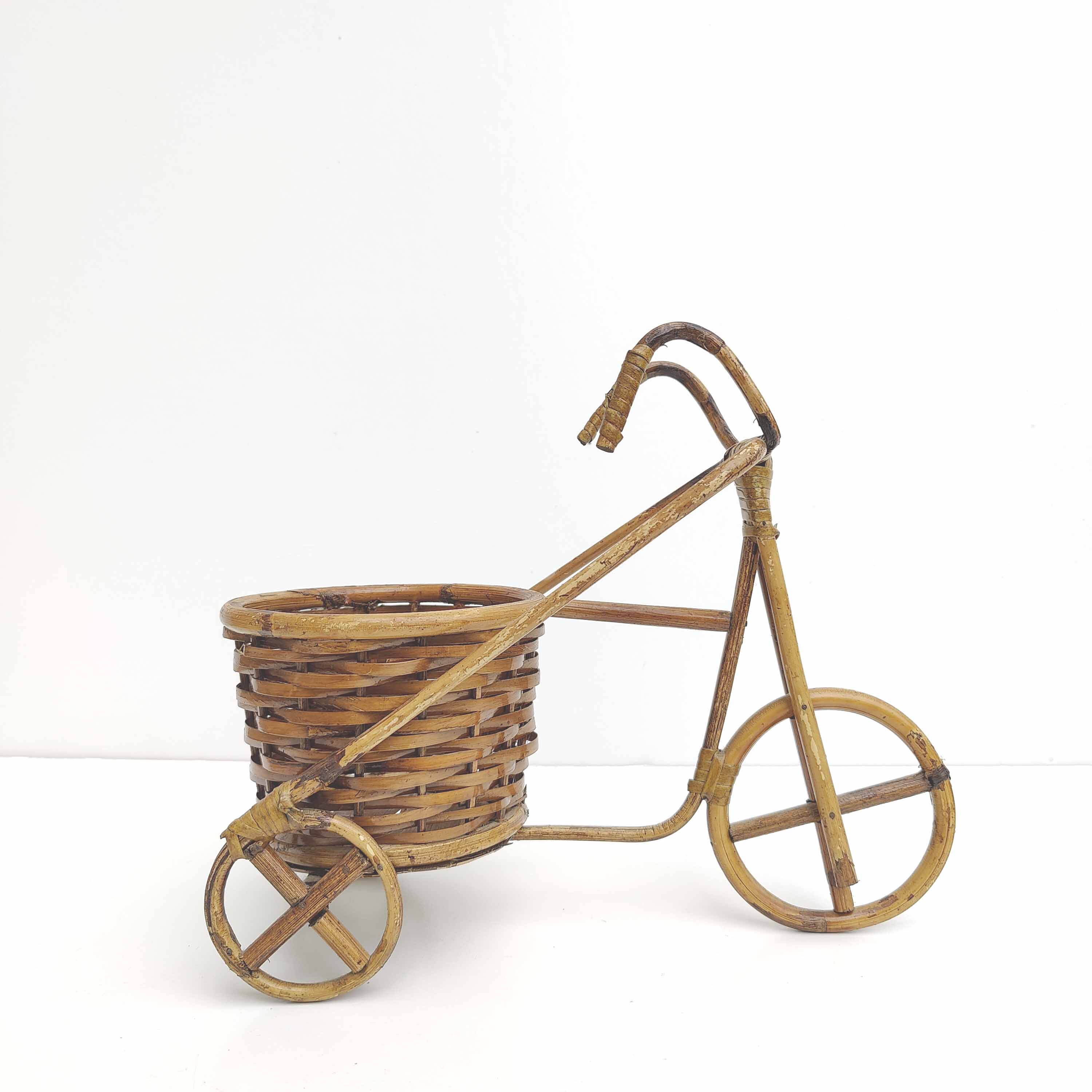 Vintage rattan bicycle plant holder
