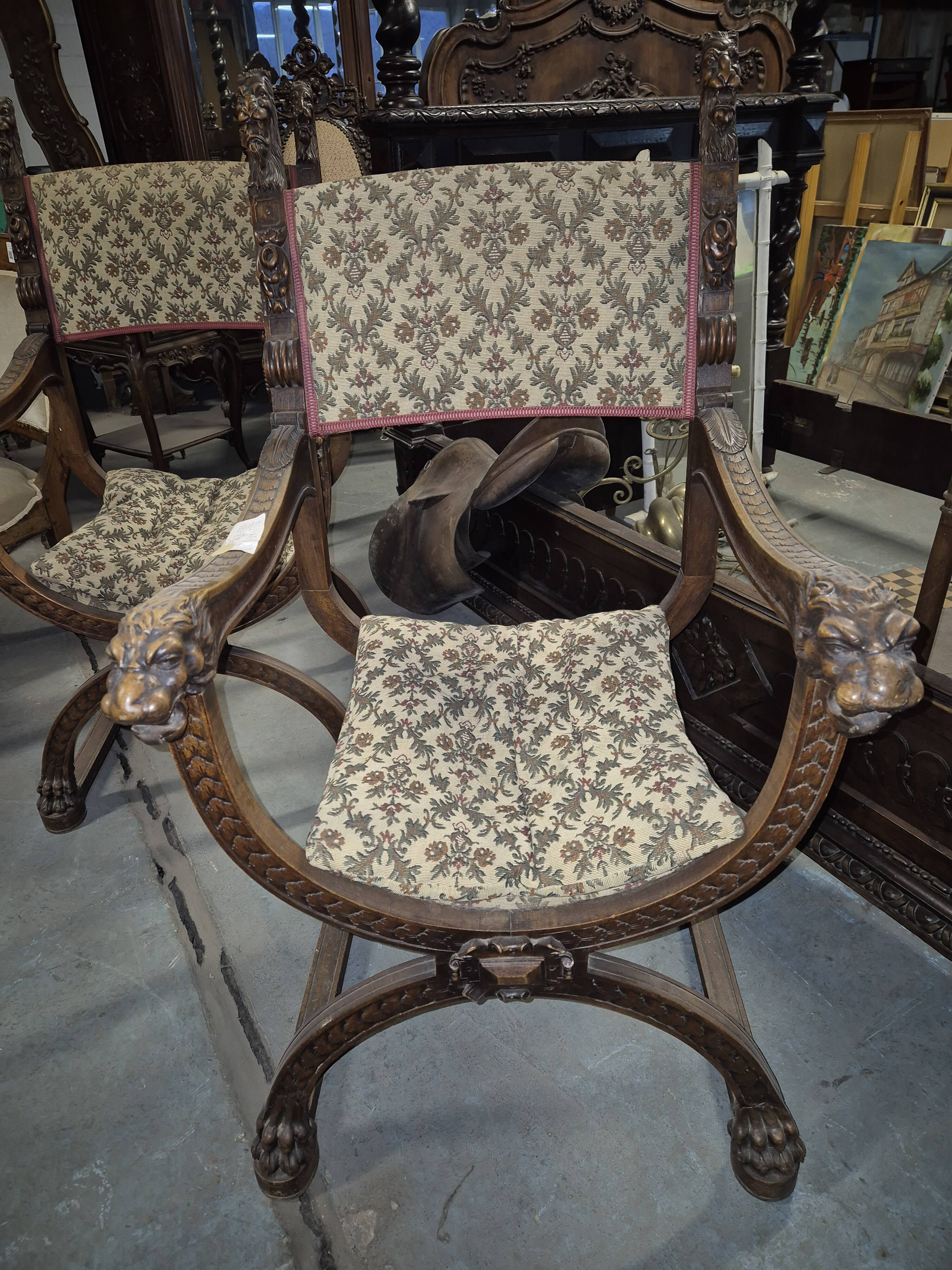 Pair of Renaissance style walnut armchairs