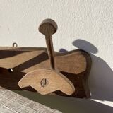 Wooden wall-mounted coat rack