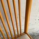 Set of 4 Scandinavian dining chairs in light wood.