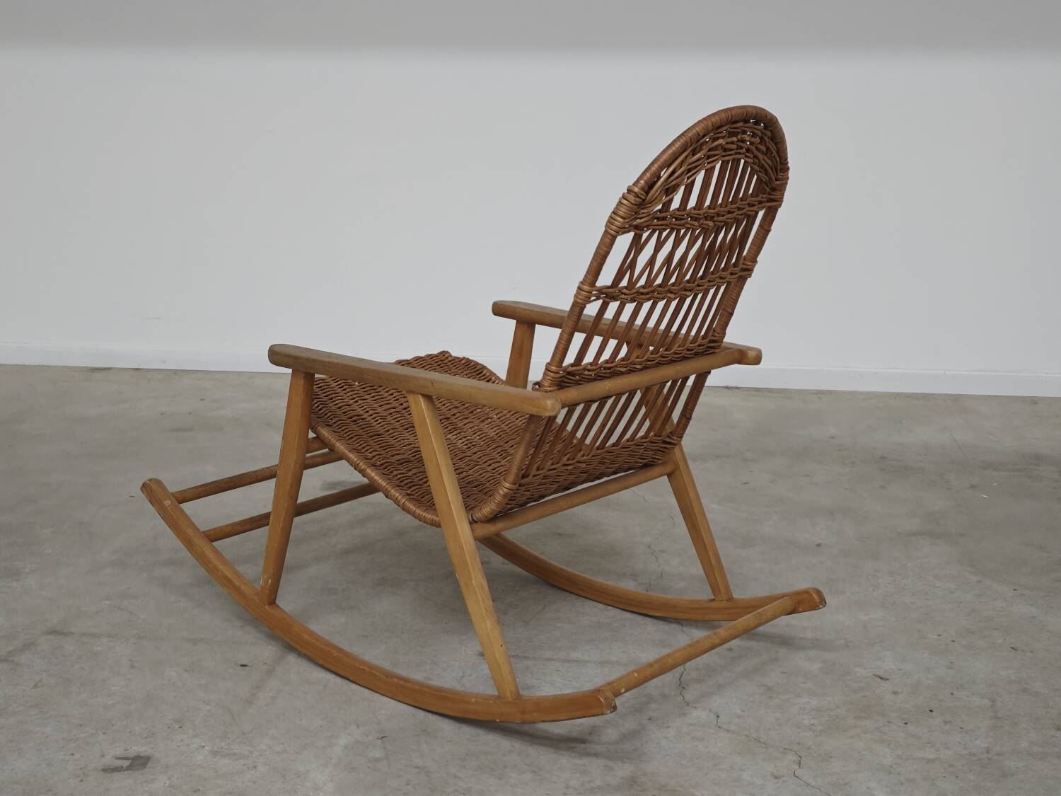 Rocking chair made of wood and wicker by ULUV from Czechoslovakia 1970