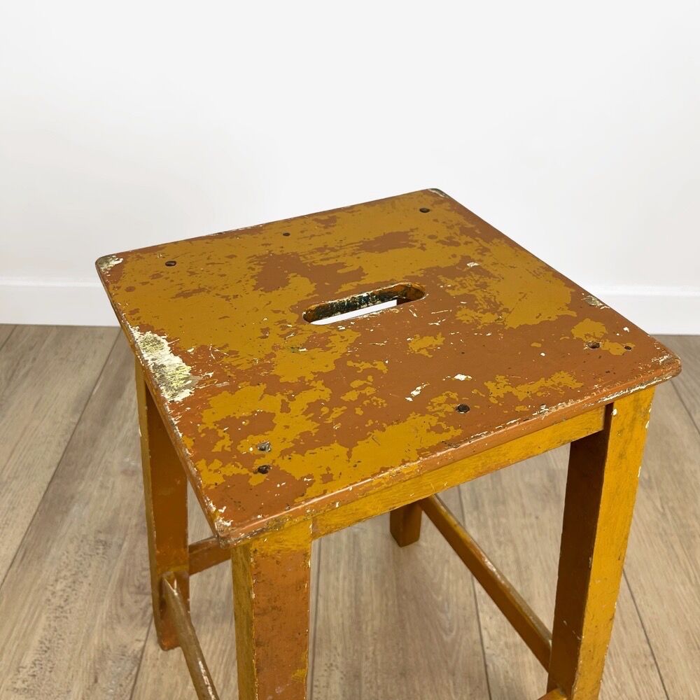 Old slotted milking stool