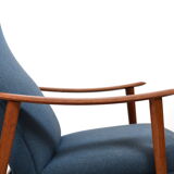 Pair of mid century Danish reclining lounge chairs in teak