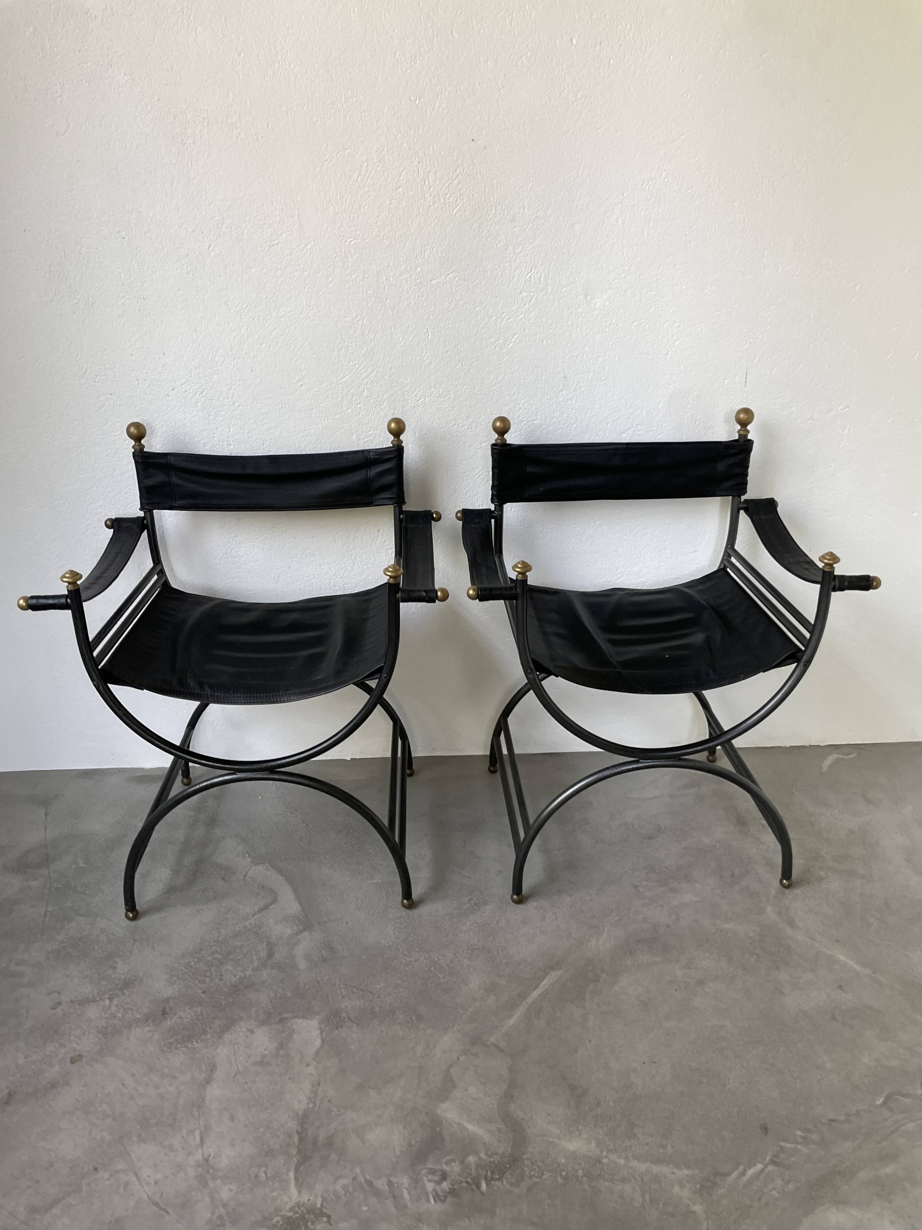 Pair of leather “curule” emperor armchairs