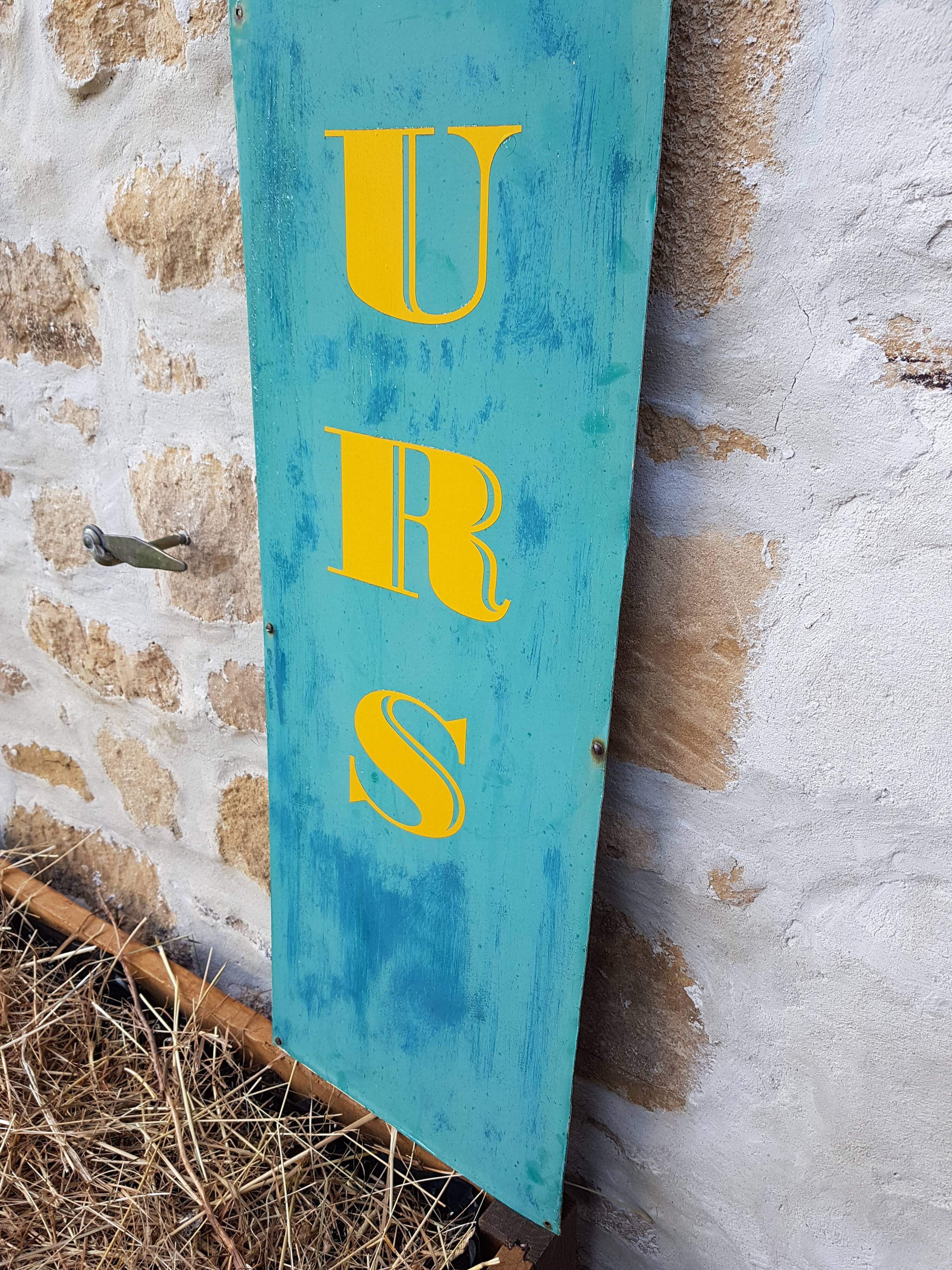 Former painted plate sign of florist