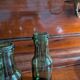 Lot de 5 bouteilles anciennes en verre vert olive