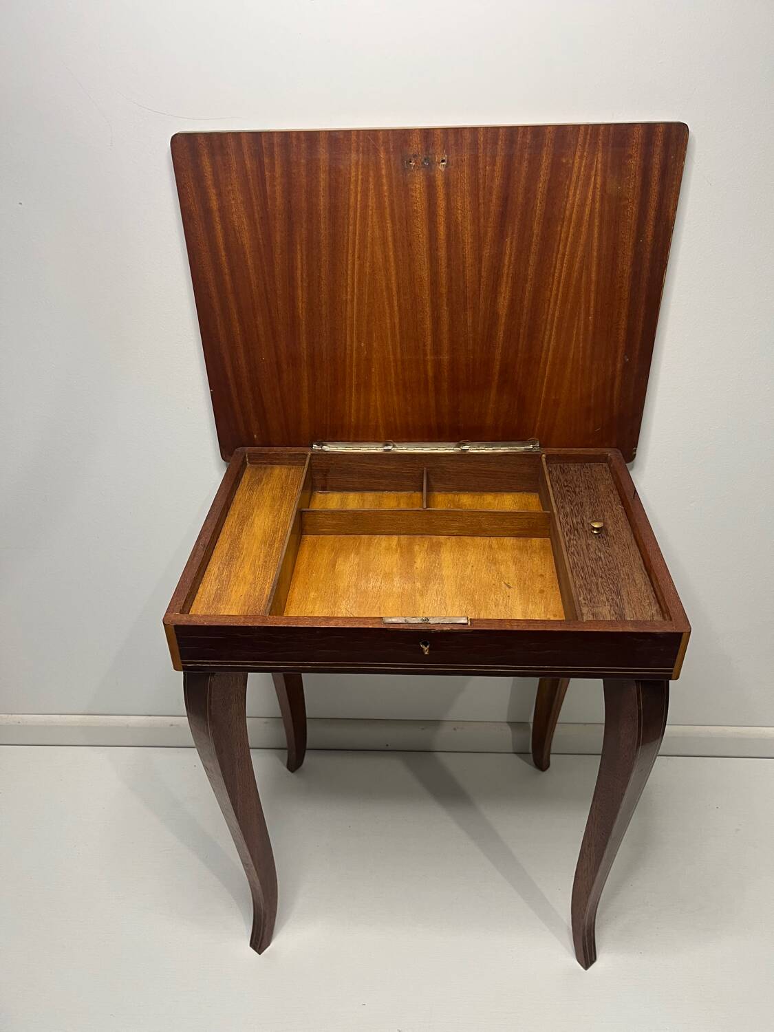 Small antique Italian inlaid table with Swiss music box.