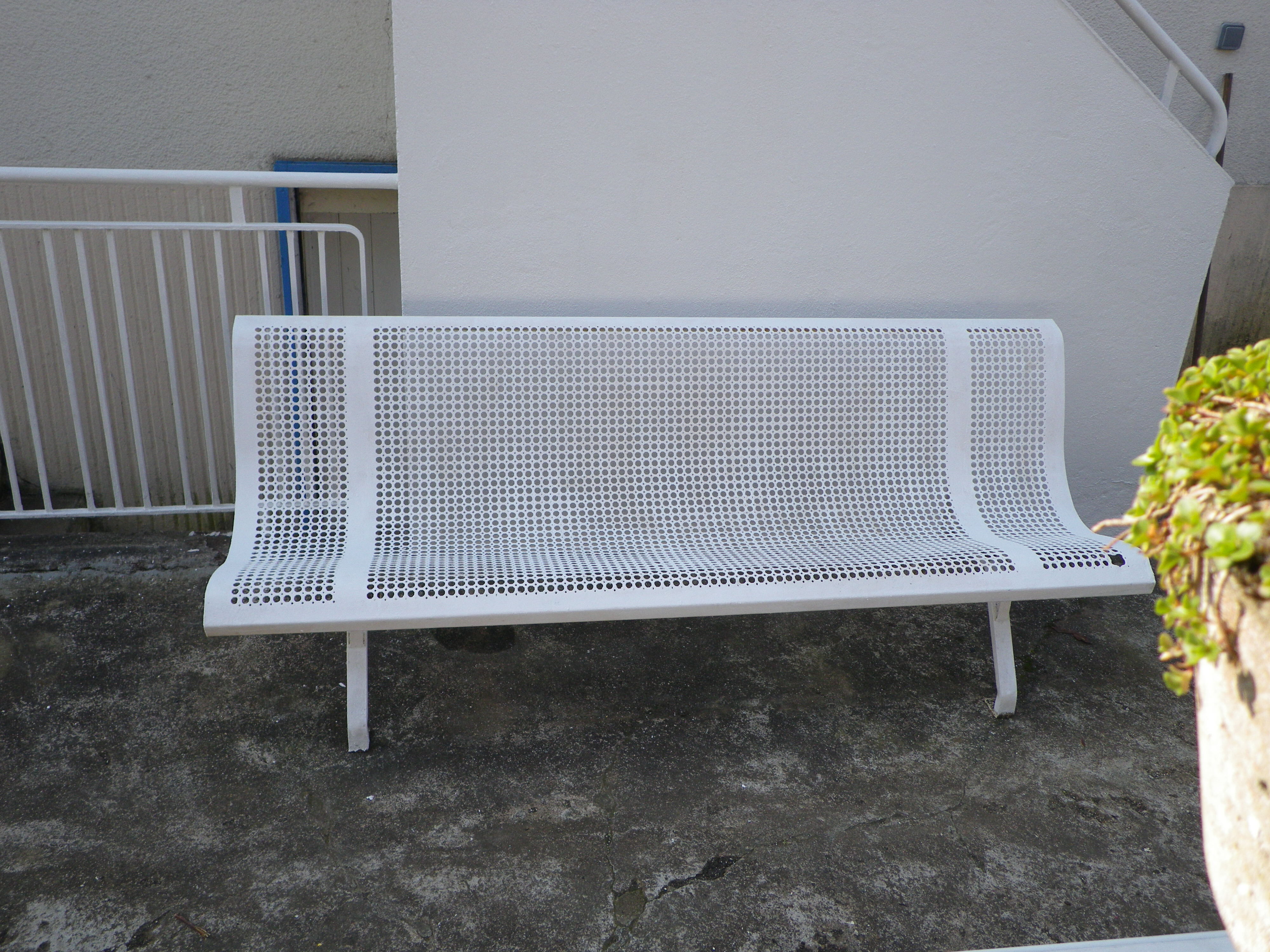 Old public wrought iron bench painted white - 50s