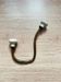 Vintage brass coat hook with ivory-style knob