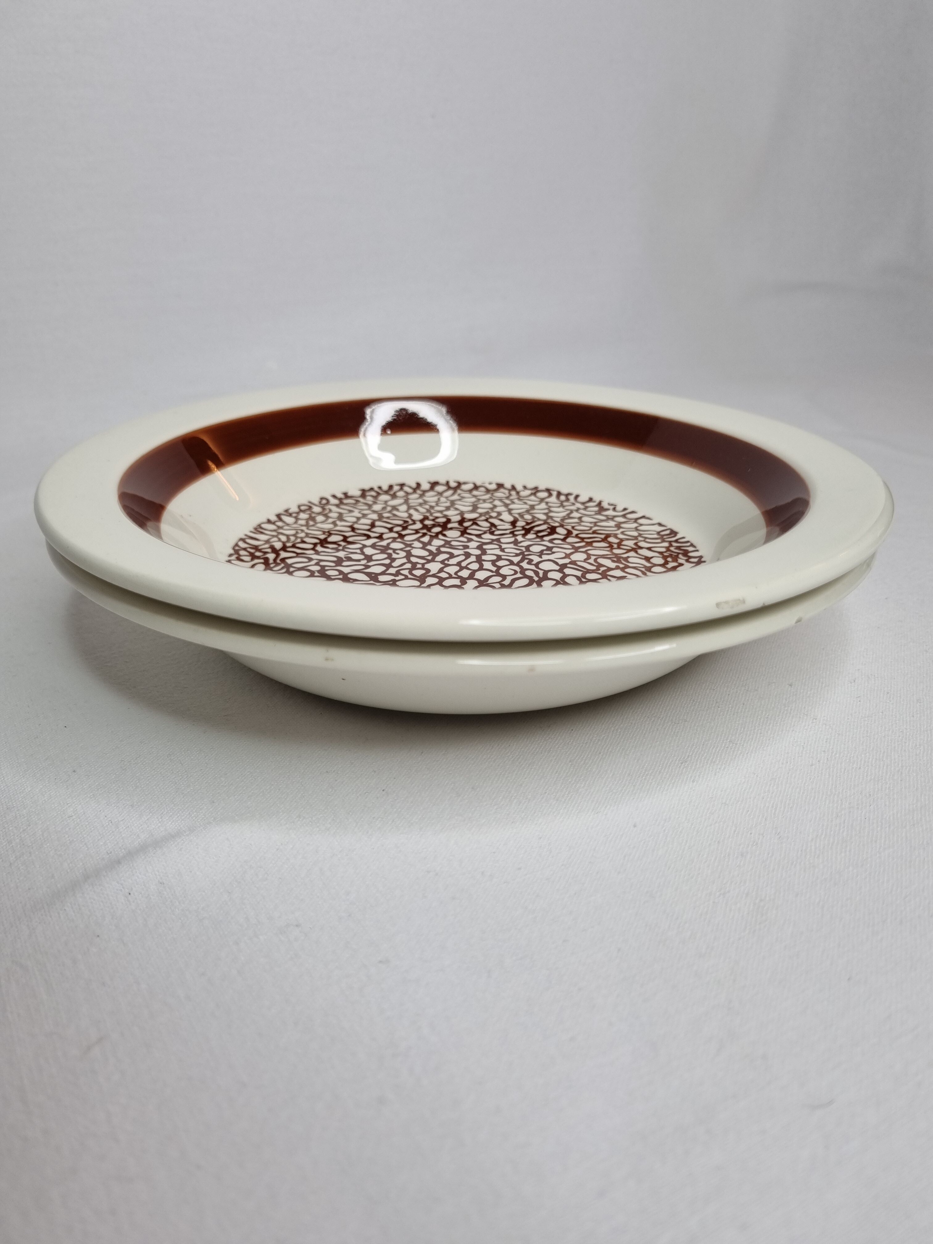 Pair of vintage hollow plates design of the faience factory of Gien