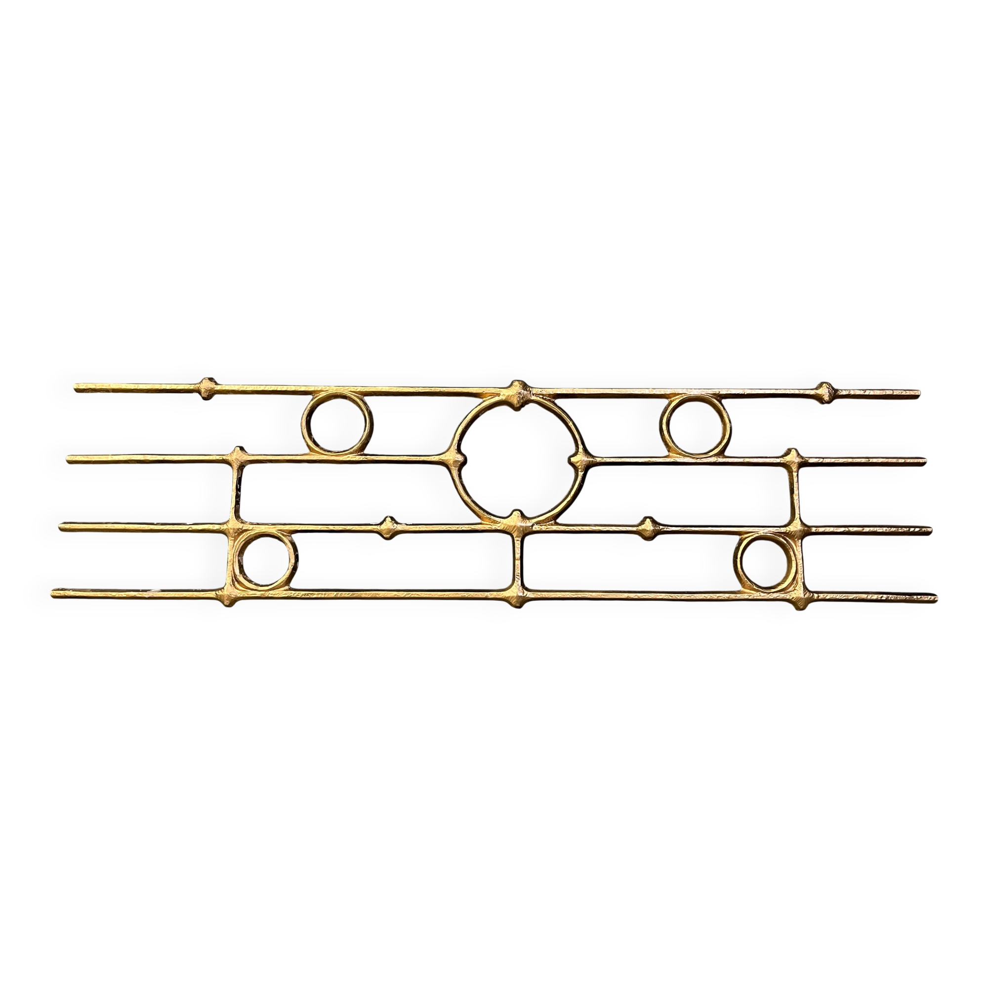 Architectural brutalist wall mounted sculpture made from cast metal.