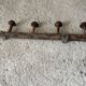 Old wooden wall coat rack