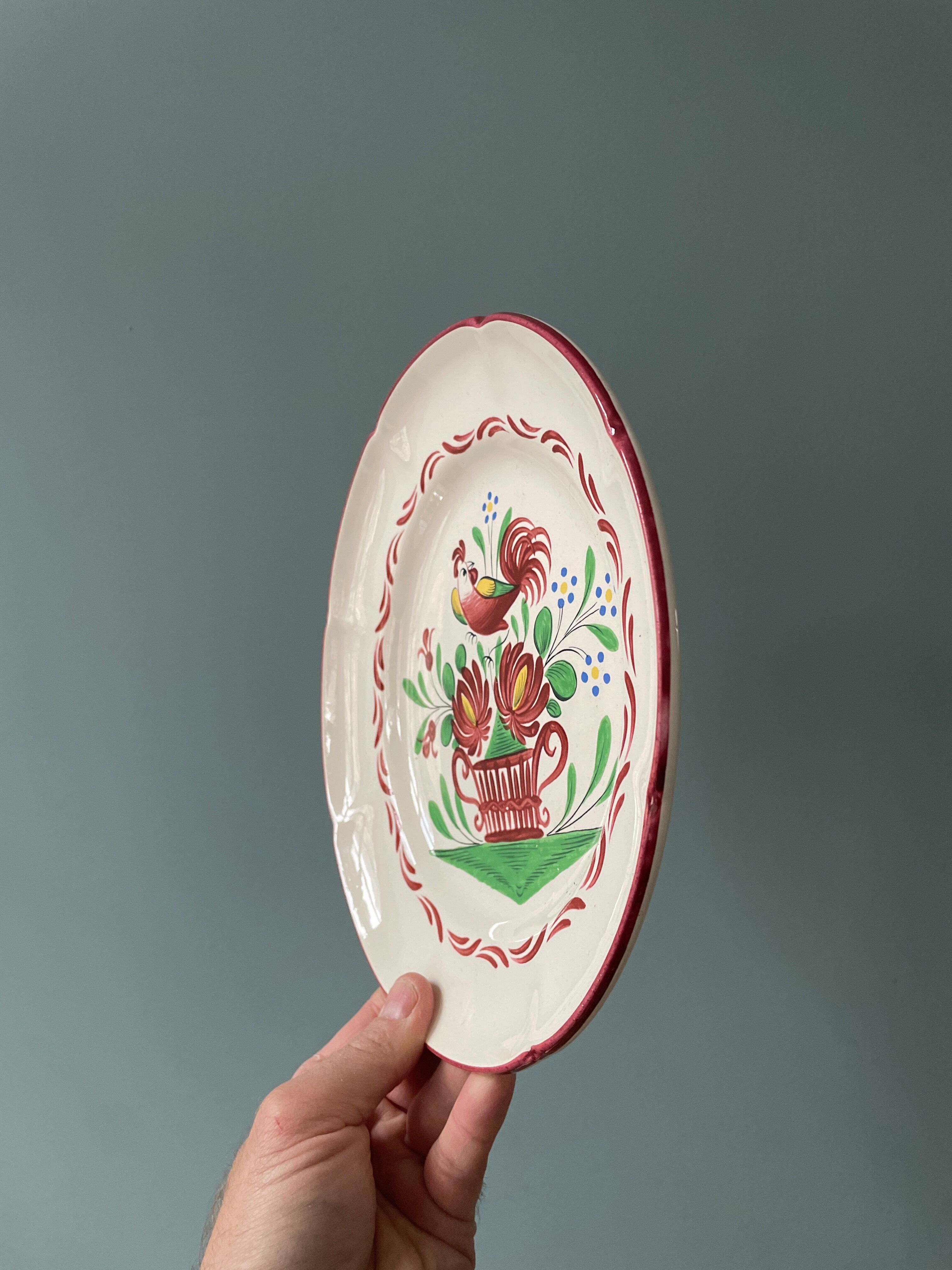 St Clement France plate, floral basket and rooster decoration