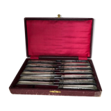 Set of 12 silver metal knives