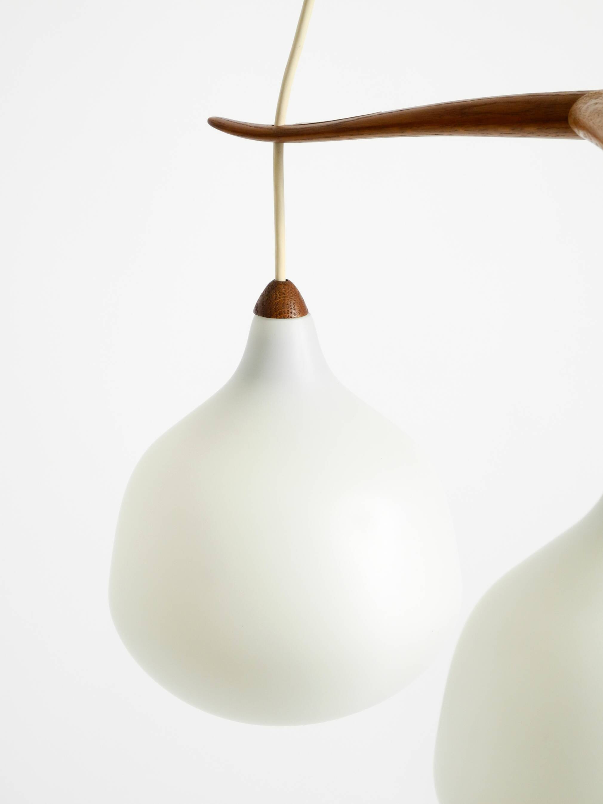 Pendant lamp with opal glass shades teak frame by Uno & Östen Kristiansson
