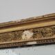 Golden stucco and wood Empire mirror