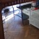 Large bevelled vintage mirror in carved walnut 110x146cm