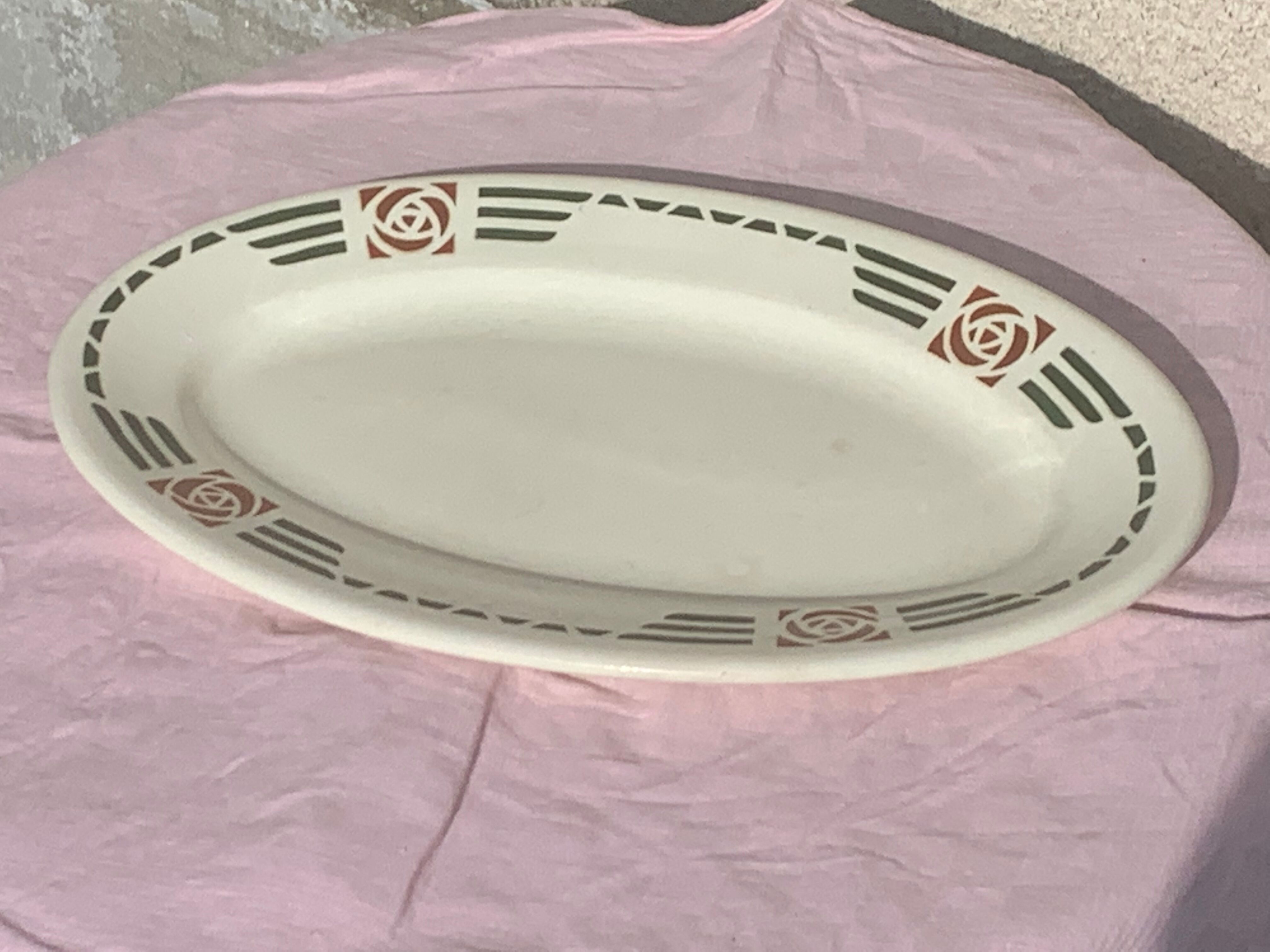 Serving dish in charcoal earthenware model Courbet art deco