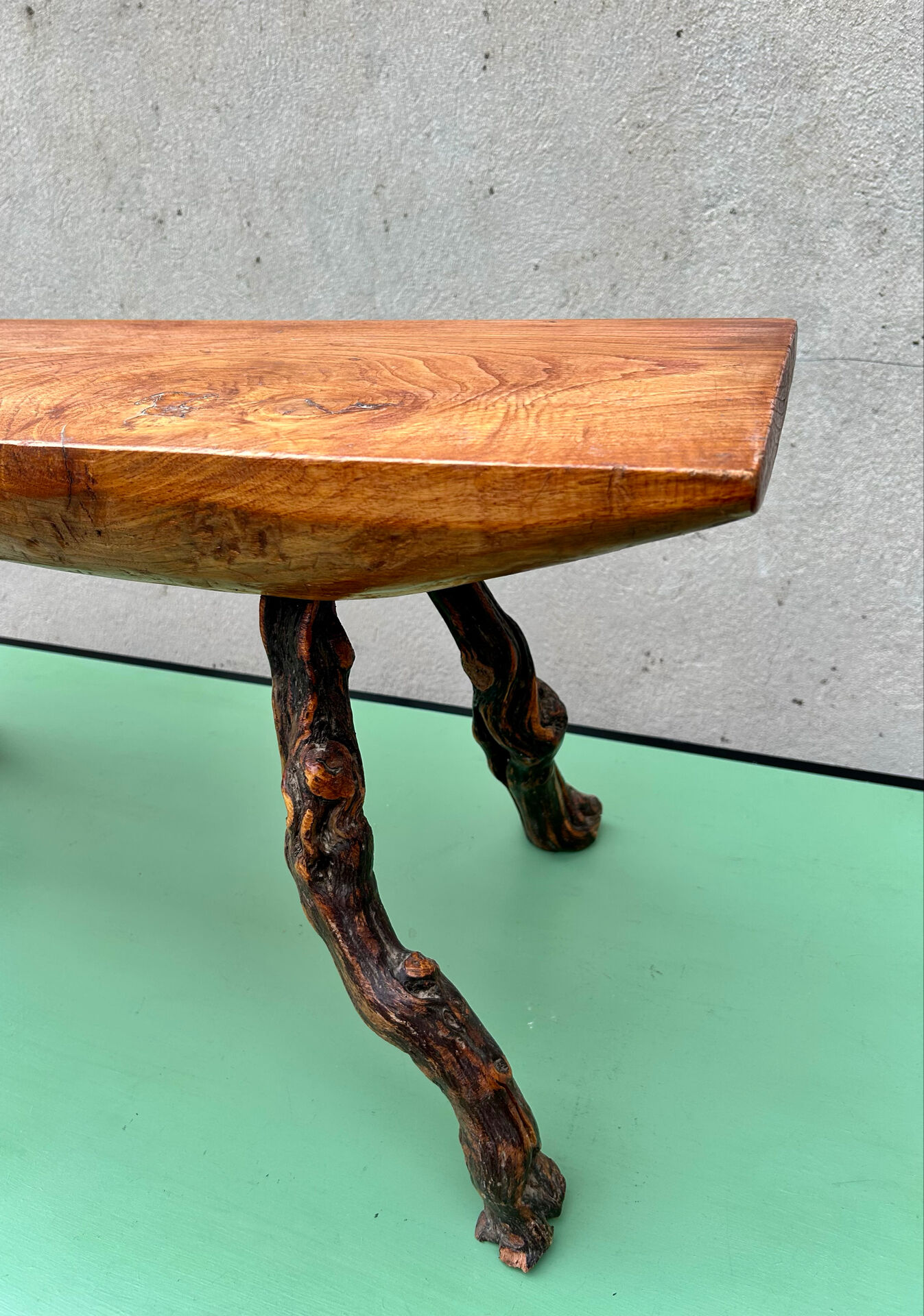 Brutalist bench made of vine and olive wood.