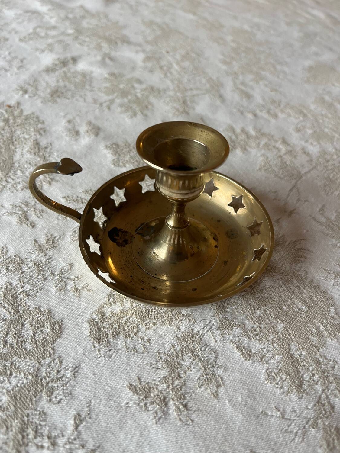 Brass cellar rat candlestick