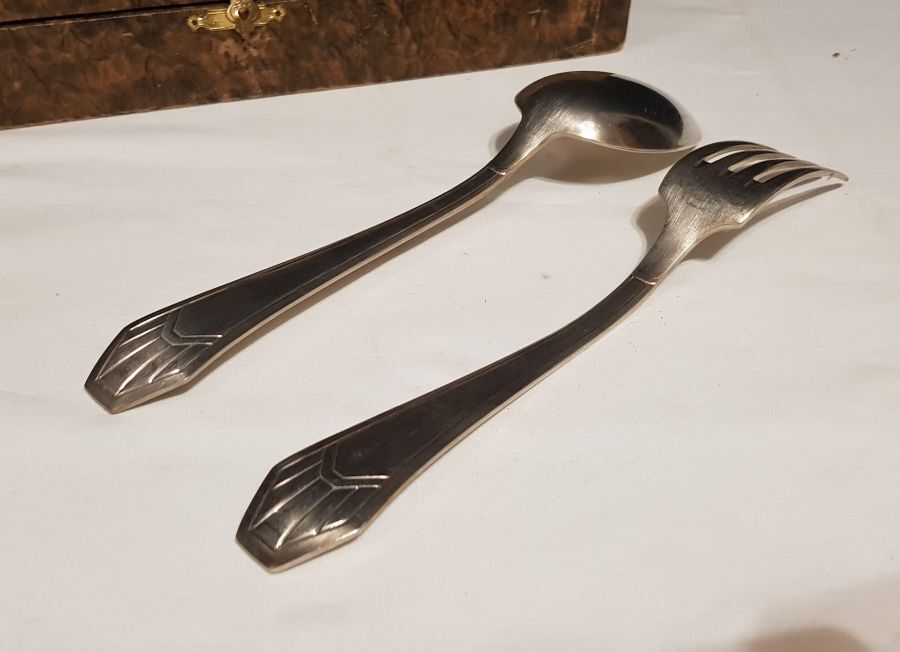 23-piece silver metal art deco cutlery set