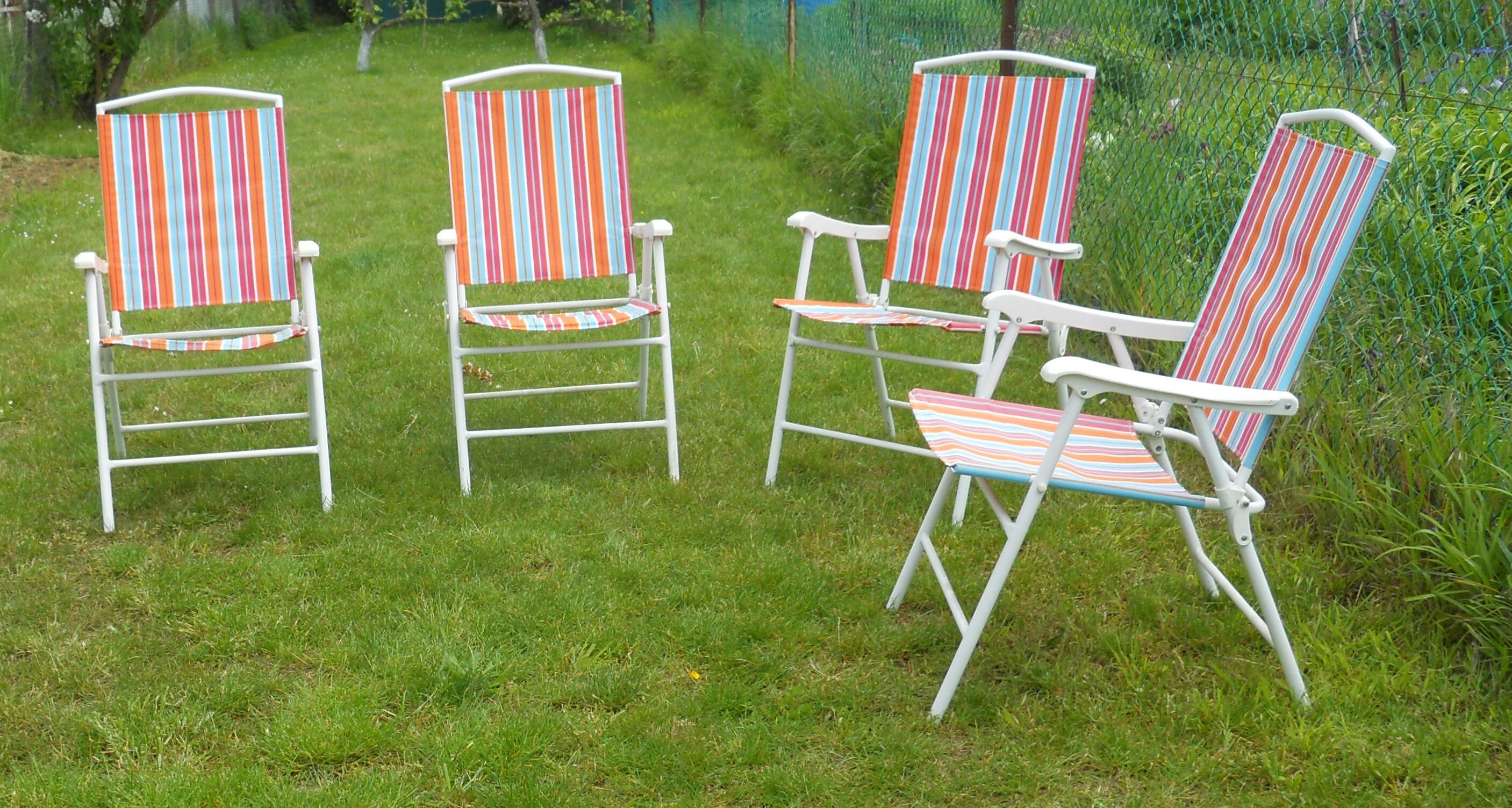4 metal garden chairs and vintage folding fabric