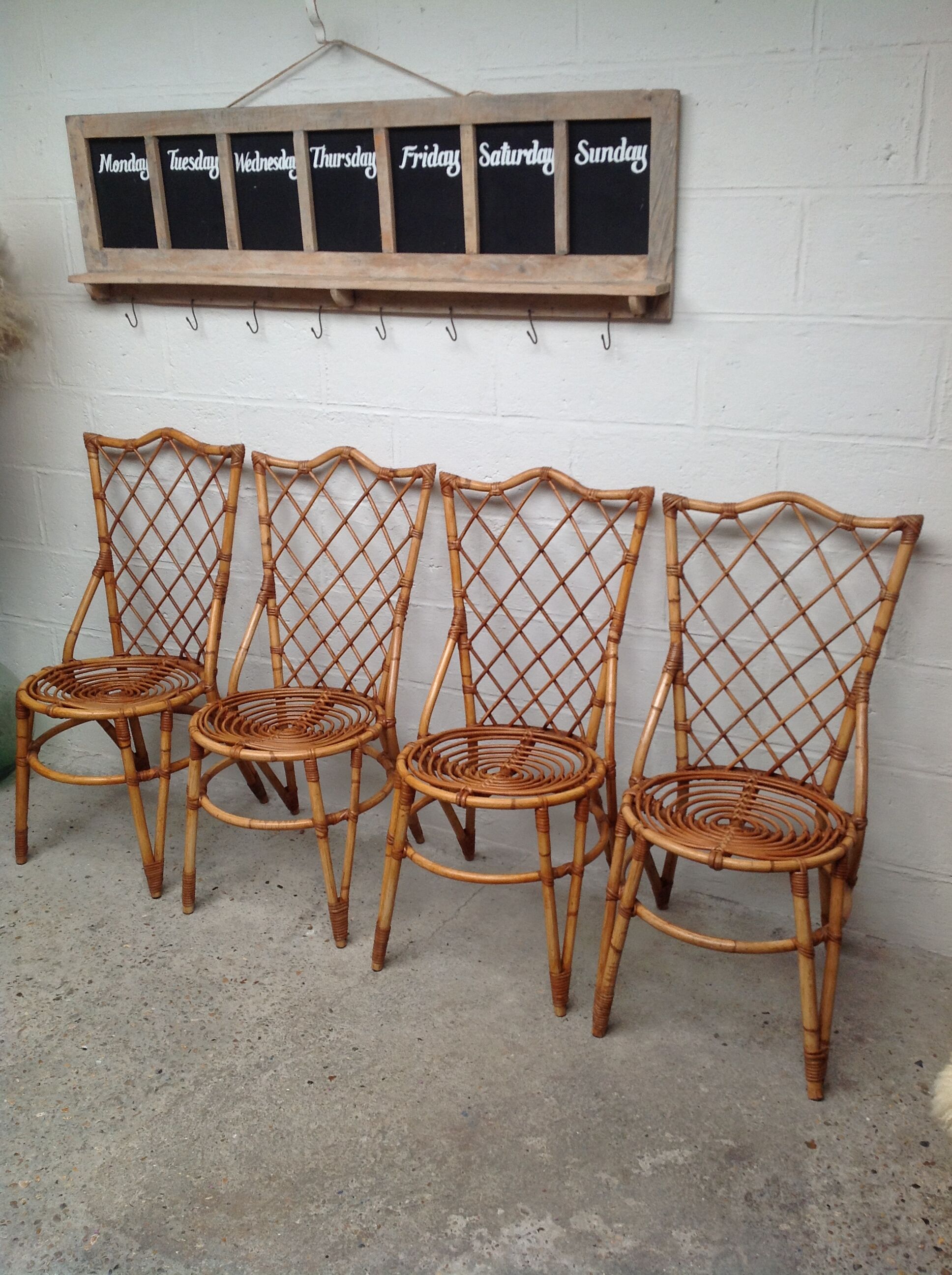 Rattan chairs by Louis Sognot