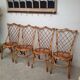 Rattan chairs by Louis Sognot