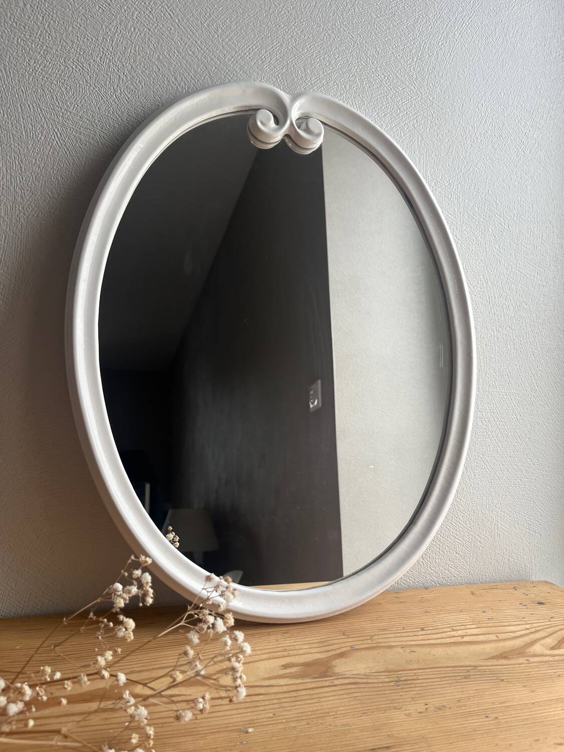 Vintage oval mirror in white enamelled cast iron