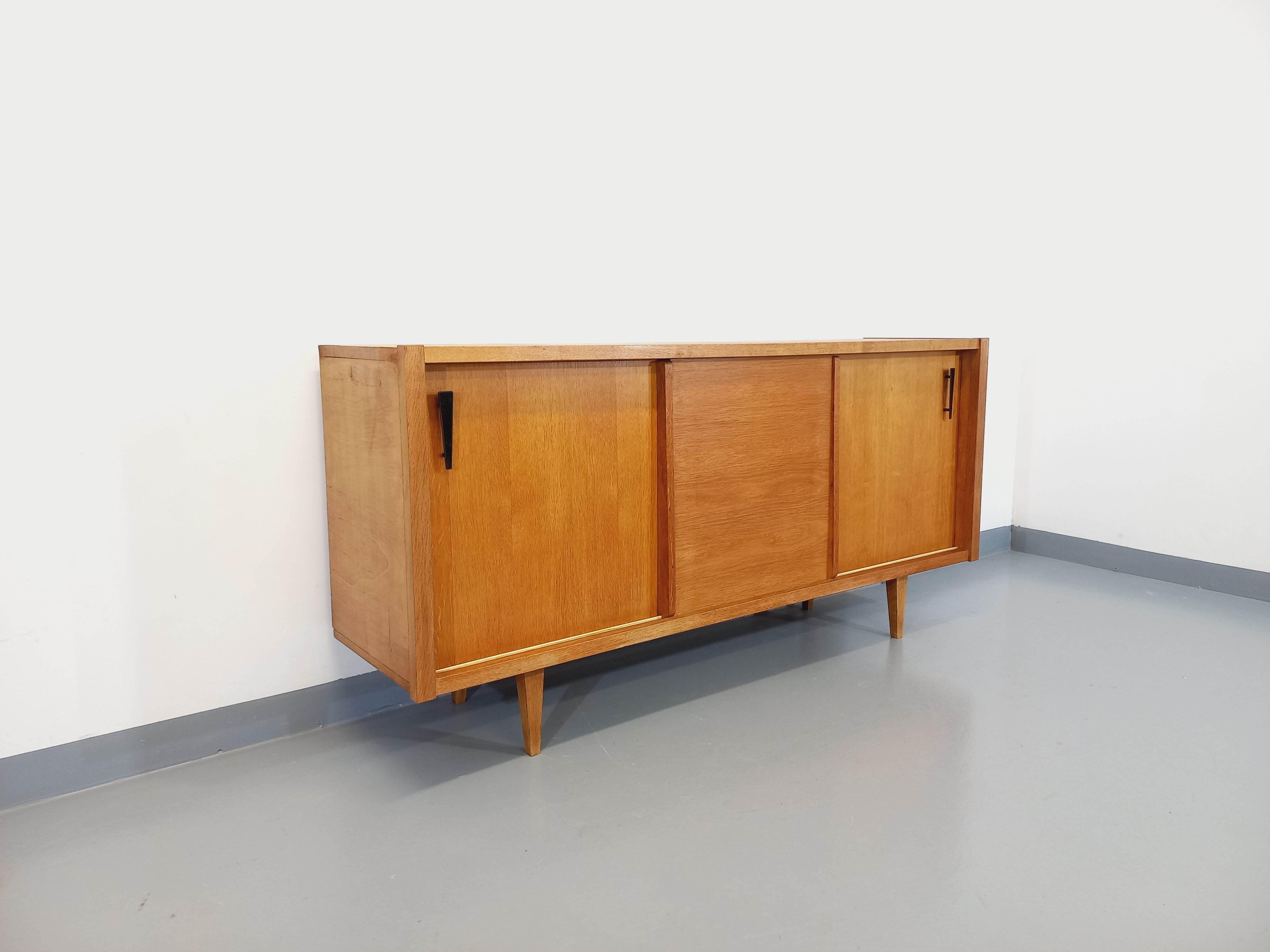 Vintage row in light oak wood from the 60s