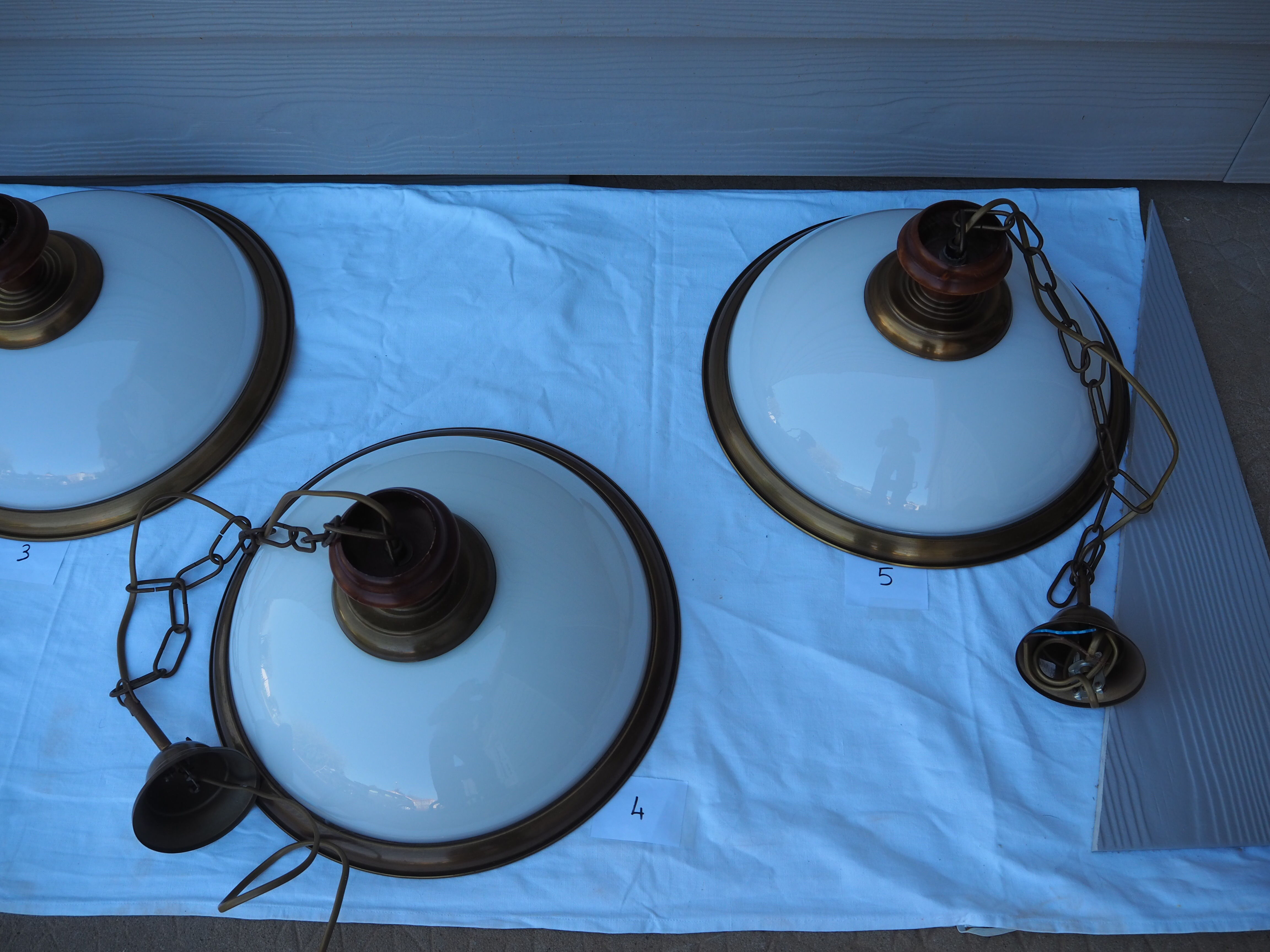 Suspension in white opaline, its edge in aged brass