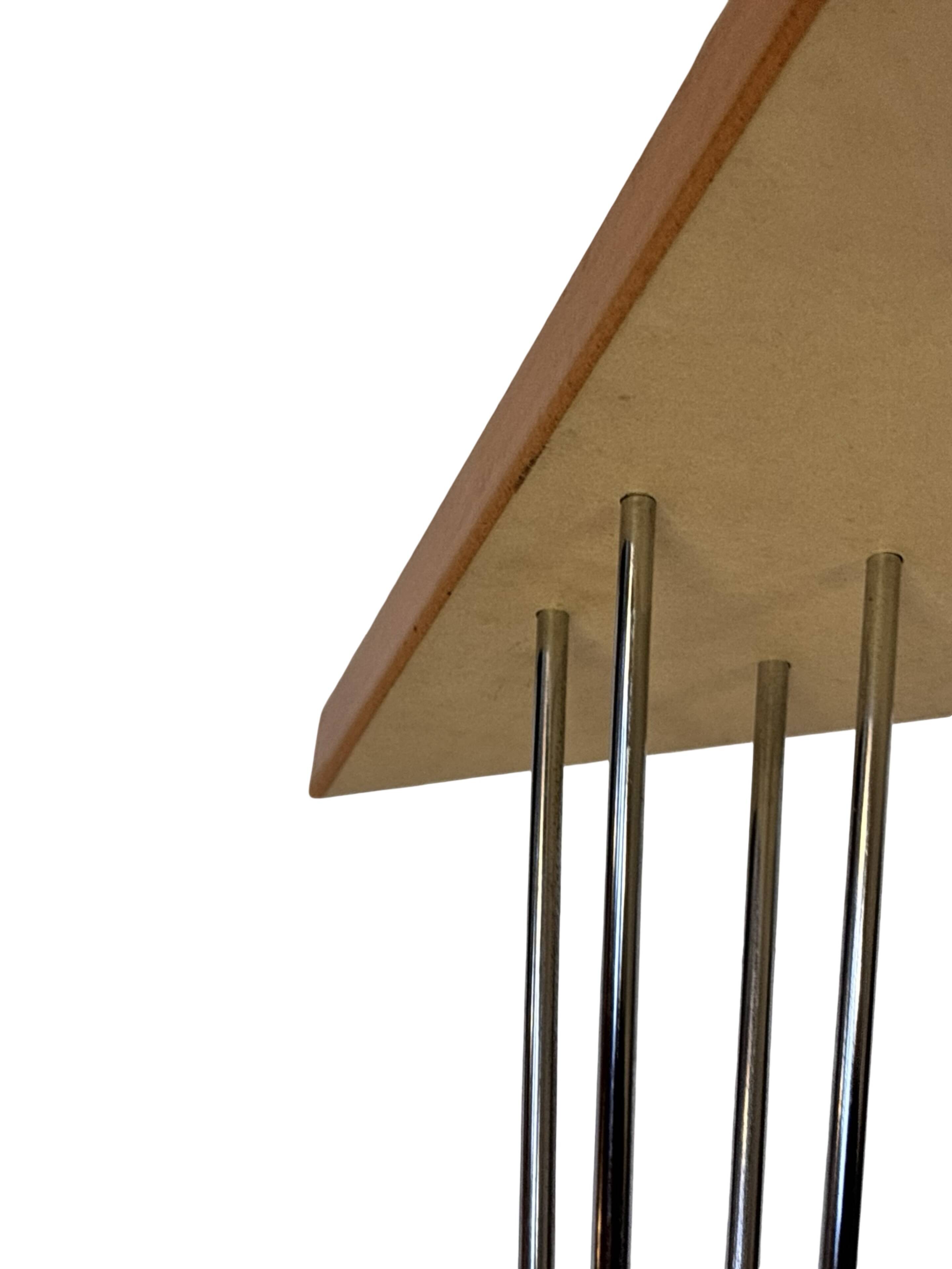 Vintage Danish triangular side table with hairpin legs design