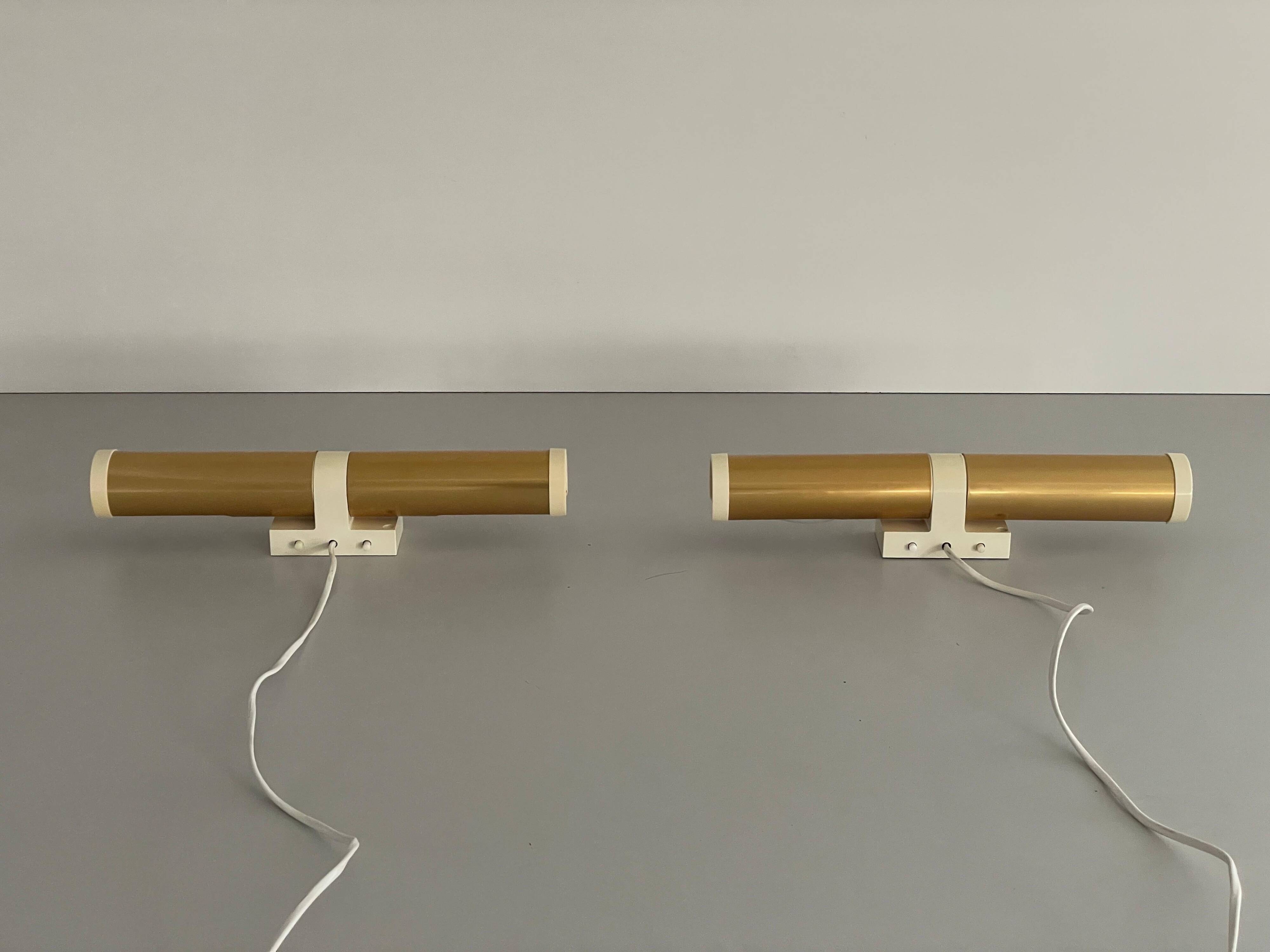 Pair of two-headed wall sconces in gold metal by ERCO, 1970s, Germany